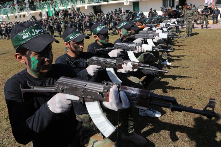 A file picture taken on January 29, 2015, shows Palestinian youth showing their skills during a graduation ceremony as part of a training camp run by the Hamas movement in Khan Yunis, in the southern Gaza Strip. (AFP photo/Said Khatib) A file picture taken on January 29, 2015, shows Palestinian youth showing their skills during a graduation ceremony as part of a training camp run by the Hamas movement in Khan Yunis, in the southern Gaza Strip. (AFP photo/Said Khatib)