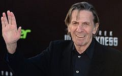 Leonard Nimoy, who played the role of Spock in the original Star Trek television series, waves on arrival for the Los Angeles premiere of the movie 'Star Trek Into Darkness" in Hollywood, California, in this May 14, 2013, file photo. (Photo credit: AFP/Frederic J. BROWN/FILES)