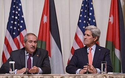 Jordanian Foreign Minister Nasser Judeh (L) speaks as US Secretary of State John Kerry looks on during a signing ceremony for a memorandum of understanding for US assistance to Jordan during a ceremony on February 3, 2015 at a hotel in Washington, DC. (photo credit: Mandel Ngan/AFP)