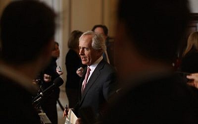 Sen. Bob Corker (R-TN) talks to reporters after attending a Senate bipartisan lunch in the Russell Senate Office Building on Capitol Hill February 4, 2015 in Washington, DC. (Photo credit: Chip Somodevilla/Getty Images/AFP) 