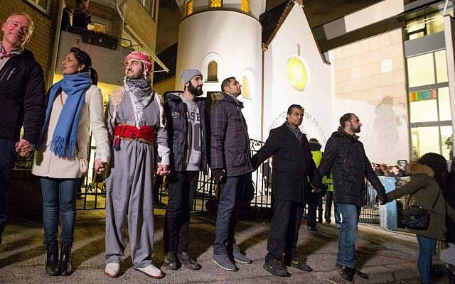 More than 1,000 people formed a "ring of peace" around the Norwegian capital's synagogue, an initiative taken by young Muslims in Norway after a series of attacks against Jews in Europe, in Oslo, Saturday, February 21 2015. (photo credit: AP/Hakon Mosvold Larsen/NTB Scanpix) More than 1,000 people formed a "ring of peace" around the Norwegian capital's synagogue, an initiative taken by young Muslims in Norway after a series of attacks against Jews in Europe, in Oslo, Saturday, February 21 2015. (photo credit: AP/Hakon Mosvold Larsen/NTB Scanpix)