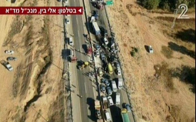 The scene of a deadly pileup in the Negev, Tuesday, February 3, 2015 (screen capture: Channel 2) The scene of a deadly pileup in the Negev, Tuesday, February 3, 2015 (screen capture: Channel 2)