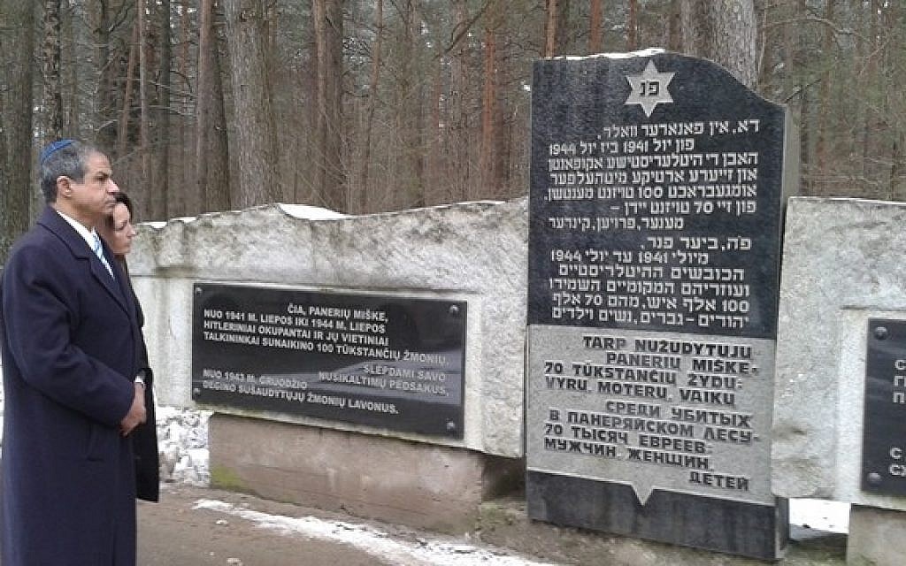 Israel's ambassador to Lithuania Amir Maymon visit a memroial for victims of the Ponary Forest Massacre, in Lithuania, February 4, 2015. (photo credit: Foreign Ministry)