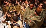Lone soldiers get help dealing with government bureaucracy at an event sponsored by Nefesh B'Nefesh, Friends of the IDF and Israeli government ministries in 2015. (Courtesy Yonit Schiller/Nefesh B'Nefesh)