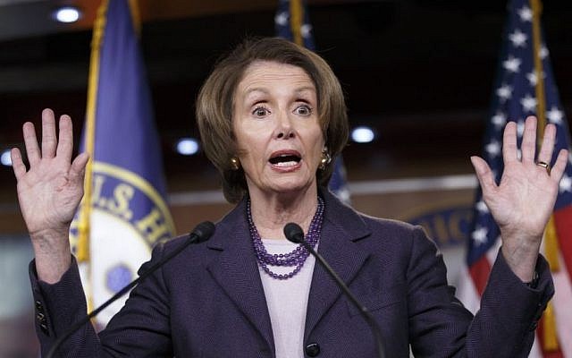 House Minority Leader Nancy Pelosi speaks with reporters on Capitol Hill in Washington, Friday, December 5, 2014 (Photo credit: J. Scott Applewhite/AP)