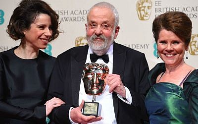 Sally Hawkins, left and Imelda Staunton, right, pose for photographers with Mike Leigh, winner the BAFTA Fellowship, in the winners room, during the British Academy Film and Television Awards 2015, at the Royal Opera House, in London, Sunday, Feb. 8, 2015. (Photo by Jonathan Short/Invision/AP)