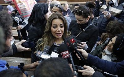 Marwa Omara, the fiancee of Mohammed Fahmy, talks to journalists in a courthouse in Cairo, Egypt, Thursday, Feb. 12, 2015. (photo credit: AP Photo/Hassan Ammar)