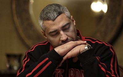 Canadian Al-Jazeera English journalist Mohamed Fahmy, pauses during an interview with The Associated Press in Cairo, Egypt, February 19, 2015. (photo credit: AP/Hassan Ammar) 