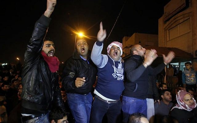 Supporters and family members of Jordanian pilot, Lt. Moaz al-Kasasbeh protest his reported killing in Amman on Feb. 3, 2015. A video released online Tuesday purportedly shows the pilot being burned to death by the Islamic State following a week-long drama over a possible prisoner exchange. (Photo credit: Raad Adayleh/AP) Supporters and family members of Jordanian pilot, Lt. Moaz al-Kasasbeh protest his reported killing in Amman on Feb. 3, 2015. A video released online Tuesday purportedly shows the pilot being burned to death by the Islamic State following a week-long drama over a possible prisoner exchange. (Photo credit: Raad Adayleh/AP)