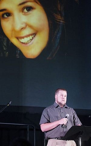 Eric Mueller talks about his sister, Kayla Mueller, during a candlelight memorial in Prescott, Ariz., Wednesday, Feb. 18, 2015. (Photo credit: AP/The Arizona Republic, Michael Chow)
