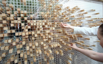 One of the exhibits at the fair, 5,000 quotations of German writers and philosophers translated into Arabic and Hebrew and engraved on wooden blocks in a giant wall (Courtesy International Book Fair)