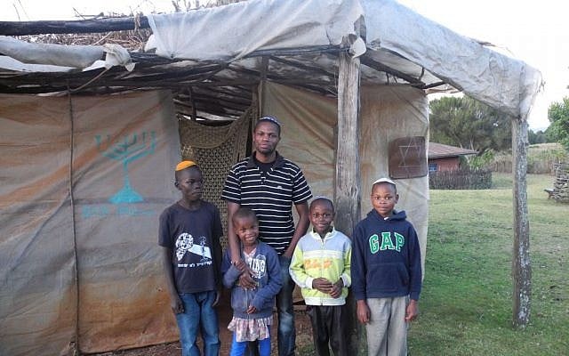 Yehuda Kimani and four of his siblings outside the synagogue in Kasuku, Kenya. (Melanie Lidman/Times of Israel)