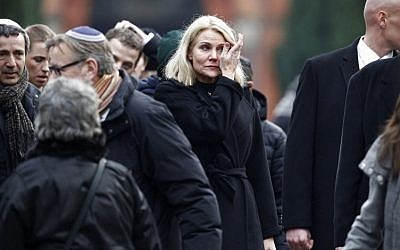 Danish Prime Minister Helle Thorning-Schmidt (C) attends the burial of Dan Uzan, Jewish victim of the February 15, 2015 attacks, at the Vestre Kirkegaard cemetery in Copenhagen on February 18, 2015. (photo credit: AFP/Scanpix Denmark/ Bax Lindhart) Danish Prime Minister Helle Thorning-Schmidt (C) attends the burial of Dan Uzan, Jewish victim of the February 15, 2015 attacks, at the Vestre Kirkegaard cemetery in Copenhagen on February 18, 2015. (photo credit: AFP/Scanpix Denmark/ Bax Lindhart)