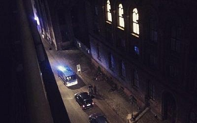 This photo, provided by Sebastian Zepeda, shows the scene near a synagogue where police reported a shooting in downtown Copenhagen, Denmark, Sunday, Feb. 15, 2015 (photo credit: AP Photo/Rasmus Thau Riddersh) 