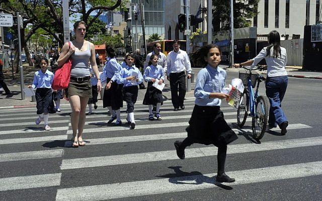 Haredi schoolgirls crossing the street in Tel Aviv (photo credit: Serge Attal/Flash 90) Haredi schoolgirls crossing the street in Tel Aviv (photo credit: Serge Attal/Flash 90)