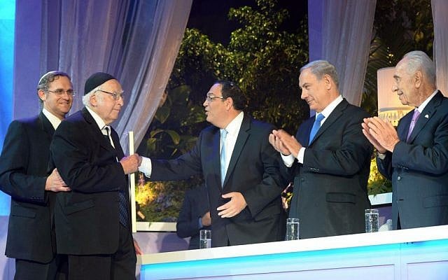 Rabbi Aharon Lichtenstein recieves the Israel prize in literature from then-education minister Shai Piron, as Prime Minister Benjamin Netanyahu, center, and then-president Shimon Peres look on in Jerusalem on May 06, 2014. (Amos Ben Gershom/GPO/Flash90) Rabbi Aharon Lichtenstein recieves the Israel prize in literature from then-education minister Shai Piron, as Prime Minister Benjamin Netanyahu, center, and then-president Shimon Peres look on in Jerusalem on May 06, 2014. (Amos Ben Gershom/GPO/Flash90)
