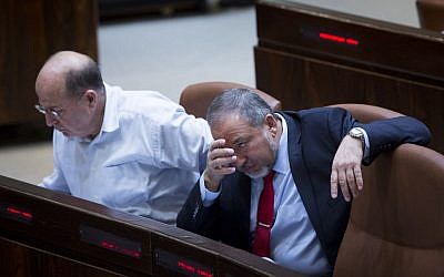 Avigdor Liberman, right, in the Knesset with Moshe Ya'alon on November 12, 2014. (photo credit: Miriam Alster/FLASH90)