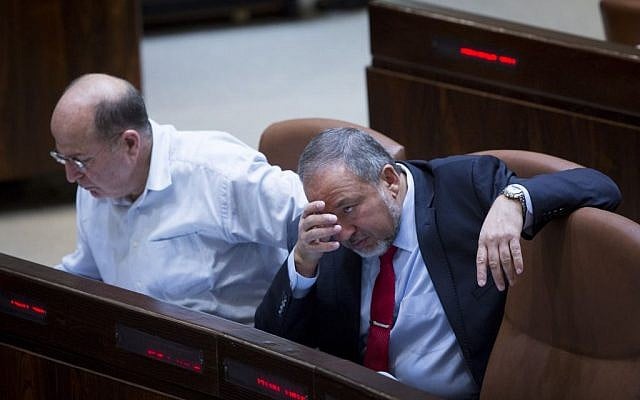 Avigdor Liberman, right, in the Knesset with Moshe Ya'alon on November 12, 2014. (photo credit: Miriam Alster/FLASH90) Avigdor Liberman, right, in the Knesset with Moshe Ya'alon on November 12, 2014. (photo credit: Miriam Alster/FLASH90)