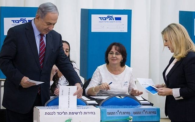 Benjamin Netanyahu and his wife Sara Netanyahu cast votes in the Likud primary on December 31, 2014. Photo credit: Miriam Alster/Flash90) Benjamin Netanyahu and his wife Sara Netanyahu cast votes in the Likud primary on December 31, 2014. Photo credit: Miriam Alster/Flash90)