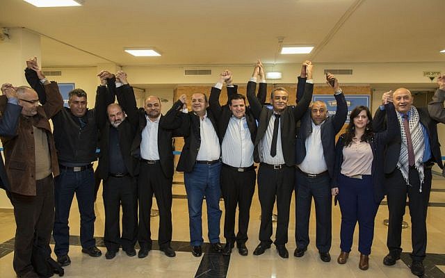 Members of the Joint List pose for a photo after presenting their list, January 28, 2015 (photo credit: Yonatan Sindel/Flash90)