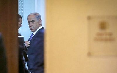 Prime Minister Benjamin Netanyahu seen at the weekly cabinet meeting at the Prime Minister Office in Jerusalem, February 1, 2015. (Alex Kolomoisky/Pool)