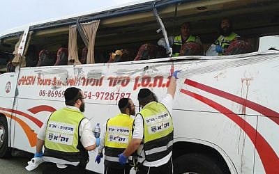 Emergency workers on site of a traffic accident that killed 8 and injured 20 in the south of Israel (photo credit: Shalom Ben Tzur/Zaka Spokesperson)