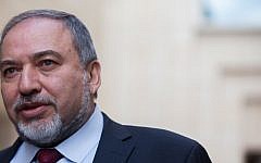 Foreign Minister Avigdor Liberman arrives at the Supreme Court in Jerusalem on February 9, 2014, (photo credit: Yonatan Sindel/Flash90)