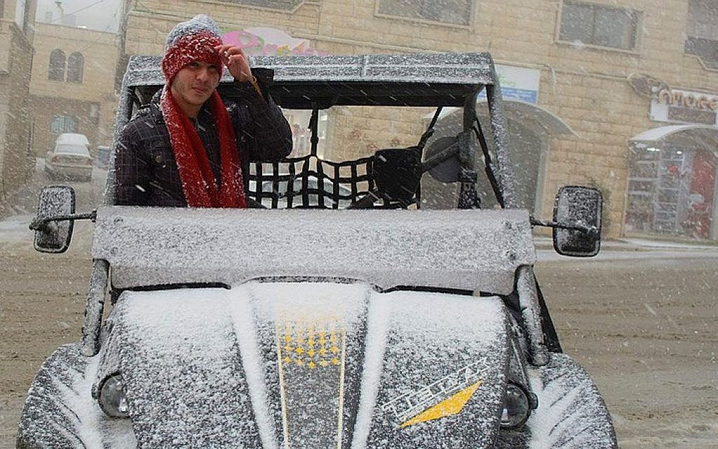 Snow falls in Majdal Shams, in the Golan Heights on February 11, 2015. (photo credit: Basal Awidat/Flash90) Snow falls in Majdal Shams, in the Golan Heights on February 11, 2015. (photo credit: Basal Awidat/Flash90)