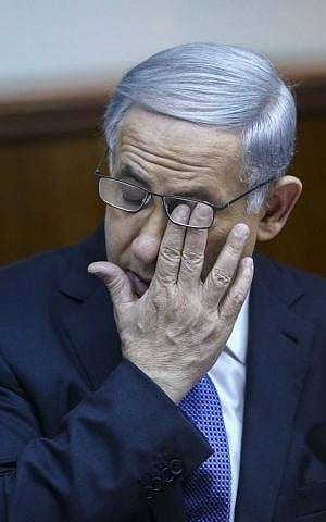 Prime Minister Benjamin Netanyahu leads the weekly cabinet meeting in Jerusalem on February 15, 2015 (photo credit: Amit Shabi/POOL)
