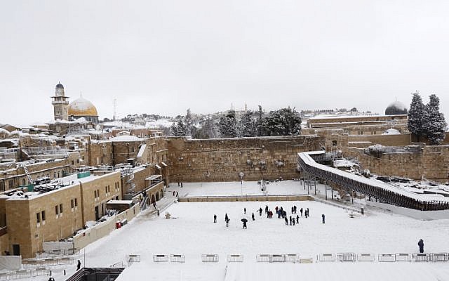 View of the Western Wall in the Old City of Jerusalem covered in snow, February 20, 2015. (photo credit: Yonatan Sindel/Flash90) View of the Western Wall in the Old City of Jerusalem covered in snow, February 20, 2015. (photo credit: Yonatan Sindel/Flash90)