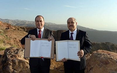 Energy and Water Minister Silvan Shalom (L) and his Jordanian counterpart Hazem Nasser seen during a signing ceremony between Jordan and Israel in Jordan on February 26, 2015, Israel and Jordan sign Tuesday the “Red-Dead” agreement to jointly build a desalination plant north of the Jordanian tourist resort of Akaba. (Photo credit: Haim Zach/GPO) Energy and Water Minister Silvan Shalom (L) and his Jordanian counterpart Hazem Nasser seen during a signing ceremony between Jordan and Israel in Jordan on February 26, 2015, Israel and Jordan sign Tuesday the 'Red-Dead' agreement to jointly build a desalination plant north of the Jordanian tourist resort of Aqaba. (Photo credit: Haim Zach/GPO)