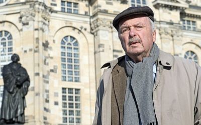 Eberhard Renner stands in front of the Frauenkirche cathedral (Church of Our Lady) during an interview one day before the 70th anniversary of the deadly Allied bombing of the city during World War II, February 12, 2015 (Photo credit: Jens Meyer/AP)
