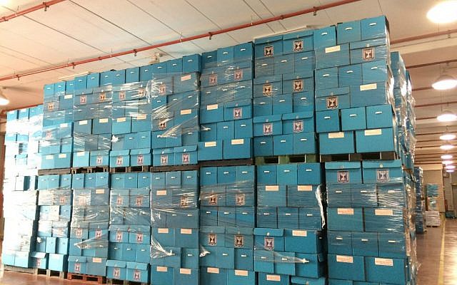Ballot boxes are stacked floor to ceiling at Central Elections Committee's logistics center, February 24, 2015. (photo credit: Renee Ghert-Zand/TOI)