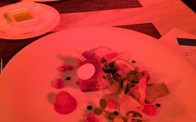 A plated wonder of root vegetable mille-feuille drizzled (photo credit: Jessica Steinberg/Times of Israel)