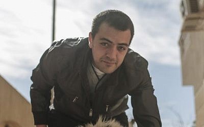 Baher Mohammed, an Al-Jazeera journalist, Egypt, February 14, 2015. (photo credit: AP/Mosa'ab Elshamy) 