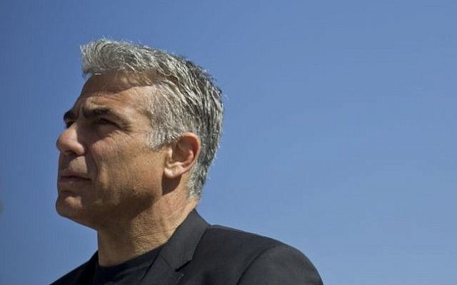 In this photo taken on Monday, Feb. 2, 2015, Yair Lapid, former finance minister and leader of the Yesh Atid party speaks in Ramle, central Israel. (photo credit: AP Photo/Ariel Schalit)