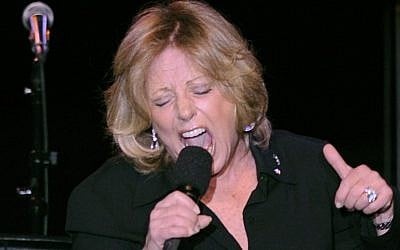 In this Tuesday, April 22, 2008, file photo, Lesley Gore performs at the ASCAP musical tribute which honored Quincy Jones with the ASCAP Pied Piper Award, in New York.  (Photo credit: AP/ Louis Lanzano, File) 