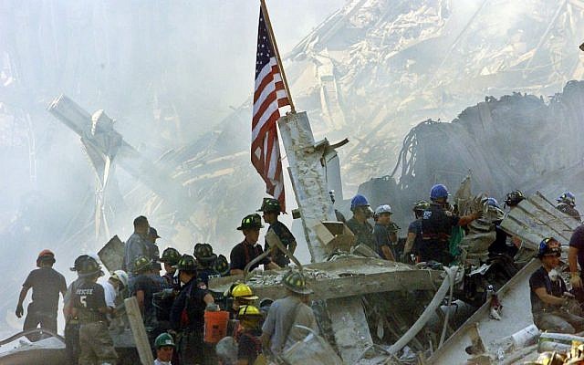 In this Sept. 13, 2001 file photo, an American flag flies over the rubble of the collapsed World Trade Center buildings in New York. (photo credit: AP Photo/Beth A. Keiser, File) In this Sept. 13, 2001 file photo, an American flag flies over the rubble of the collapsed World Trade Center buildings in New York. (photo credit: AP Photo/Beth A. Keiser, File)