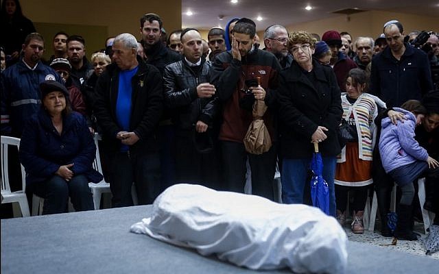 Family and friends mourn at the funeral of 4-year old Adele Bitton on February 18, 2015. (photo credit: Yonatan Sindel/FLASH90) Family and friends mourn at the funeral of 4-year old Adele Bitton on February 18, 2015. (photo credit: Yonatan Sindel/FLASH90)