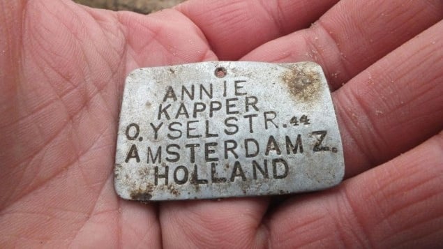 A metal plate bearing the name of 13-year-old Annie Kapper from Amsterdam was found at the Sobibor death camp in eastern Poland in 2013. (Courtesy of Yoram Haimi/JTA) A metal plate bearing the name of 13-year-old Annie Kapper from Amsterdam was found at the Sobibor death camp in eastern Poland in 2013. (Courtesy of Yoram Haimi/JTA)