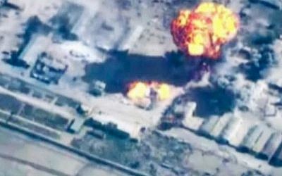 In this image made from undated video provided by Jordanian military via Jordan TV, explosions go off as the military carries out airstrikes at an undisclosed location in Syria against the Islamic State. (AP/Jordanian military via Jordan TV)