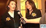 Miryam Flint (left) and Doris Chance (right) developed a jewel-encrusted yellow star brooch that bears the word 'Pride.' (Photo credit: Screenshot)