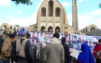 Relatives of Egyptian Coptic Christians held by the Islamic State protest in Egypt (screen capture: YouTube) Relatives of Egyptian Coptic Christians held by the Islamic State protest in Egypt (screen capture: YouTube)