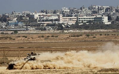 An Israeli Merkava tank operating along the Gaza border on August 6, 2014 (Miriam Alster/ Flash 90)