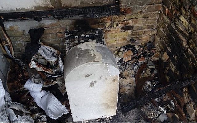 This photo released February 22, 2015 shows the torched grave of a daughter of Rabbi Nachman of Breslov, which was recently renovated by Oholei Tzadikim. (Photo credit: Oholei Tzadikim) This photo released February 22, 2015 shows the torched grave of a daughter of Rabbi Nachman of Breslov, which was recently renovated by Oholei Tzadikim. (Photo credit: Oholei Tzadikim)