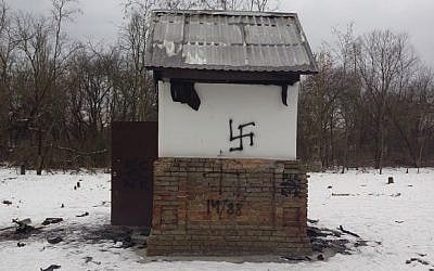 The desecrated grave site of a daughter of Rabbi Nachman of Breslov in central Ukraine, February 22, 2015. (Photo credit: Oholei Tzadikim) 