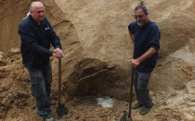 Israeli archaeologist Yoram Haimi, right, has been warning of threats to important historical artifacts at the Sobibor death camp in Poland, September 2013. (Courtesy of Yoram Haimi/JTA)