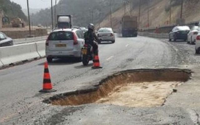 A pothole on Highway 1, March 18 2014 (Photo credit: Courtesy) A pothole on Highway 1, March 18 2014 (Photo credit: Courtesy)
