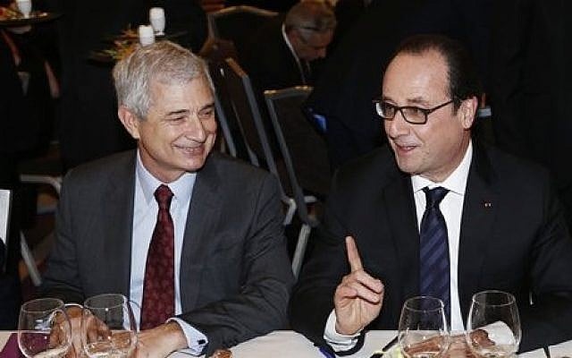 French President Francois Hollande, right, attends the 30th annual dinner held by the French Jewish Institutions Representative Council (Conseil Representatif des Institutions juives de France, CRIF) next to French Parliament President Claude Bartolone, left, in Paris, France, Monday, Feb. 23, 2015. (photo credit: AP Photo/Etienne Laurent, pool) French President Francois Hollande, right, attends the 30th annual dinner held by the French Jewish Institutions Representative Council (Conseil Representatif des Institutions juives de France, CRIF) next to French Parliament President Claude Bartolone, left, in Paris, France, Monday, Feb. 23, 2015. (photo credit: AP Photo/Etienne Laurent, pool)