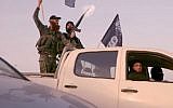 A still image showing actors dressed as Islamic State fighters, in a Likud party campaign video released  February 15, 2015. (YouTube: screen capture)